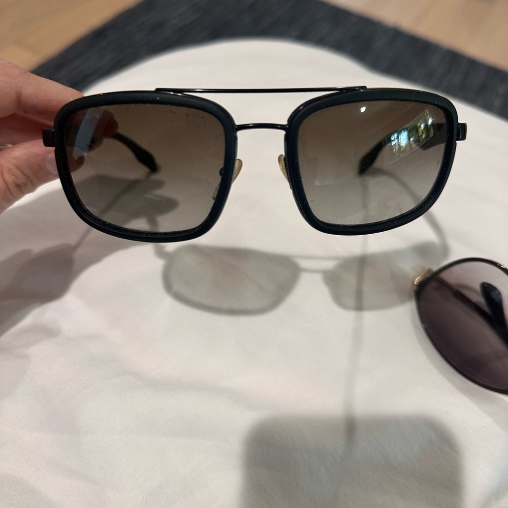Men’s Prada Sunglasses.